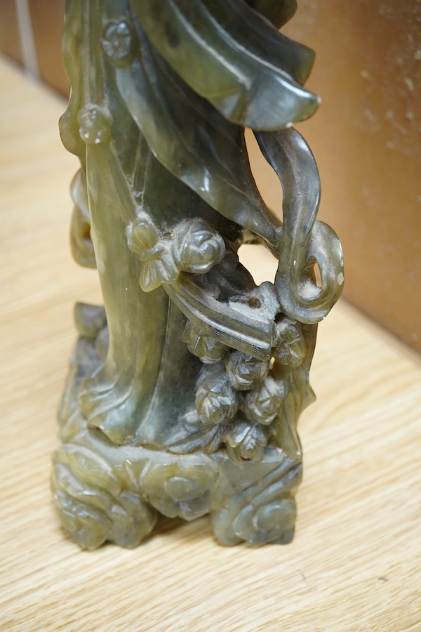 A Chinese carved green soapstone figure of Guanyin, 34cm high. Condition - fair to good